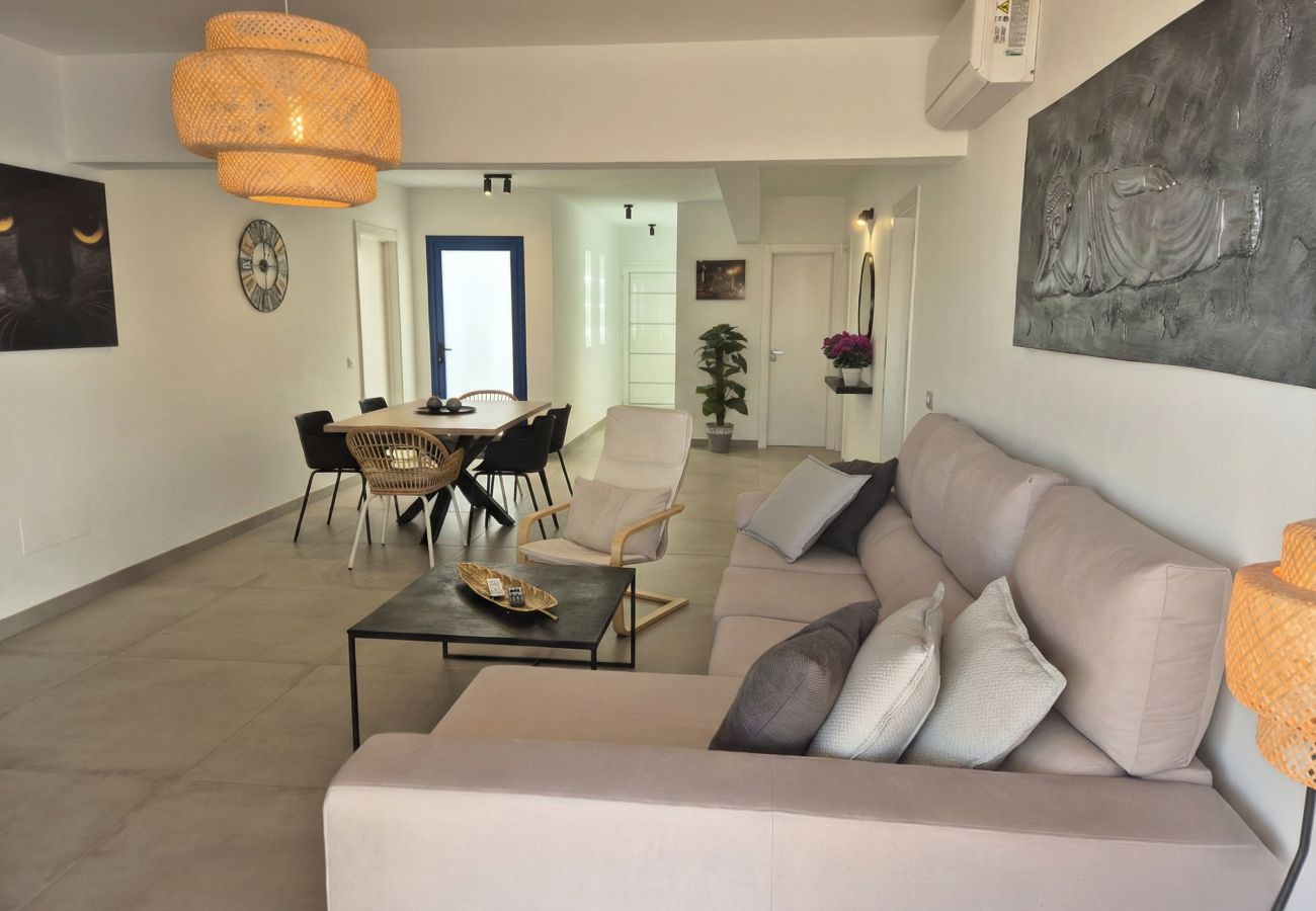 Grey L-shaped sofa in modern living room