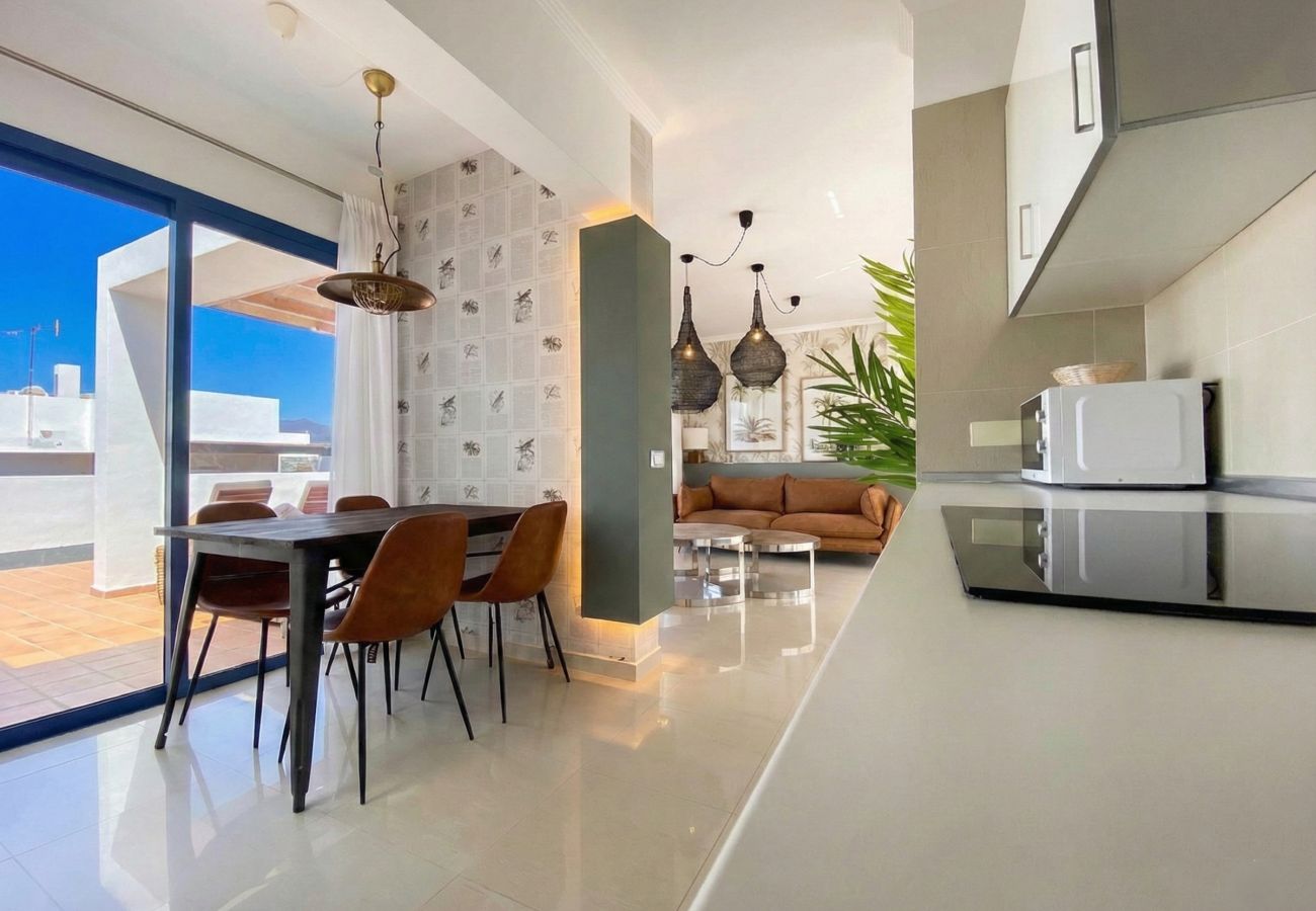 Dining table and view of the kitchen