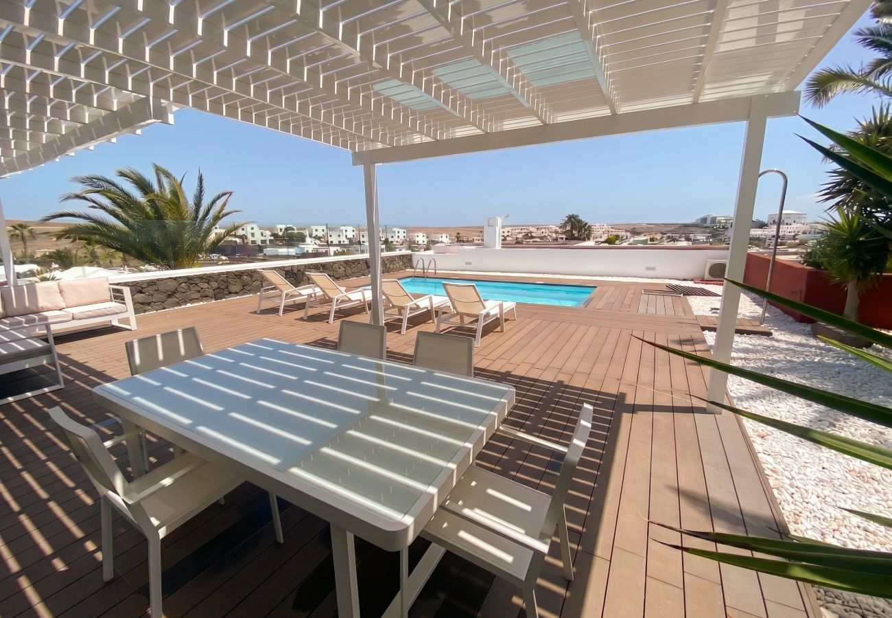 Glass dining table on terrace